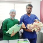 Dr Sharad and Dr Shalaka Ingle with new born babies