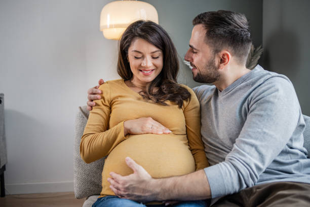 We are growing! Future parents are excited about their unborn baby.